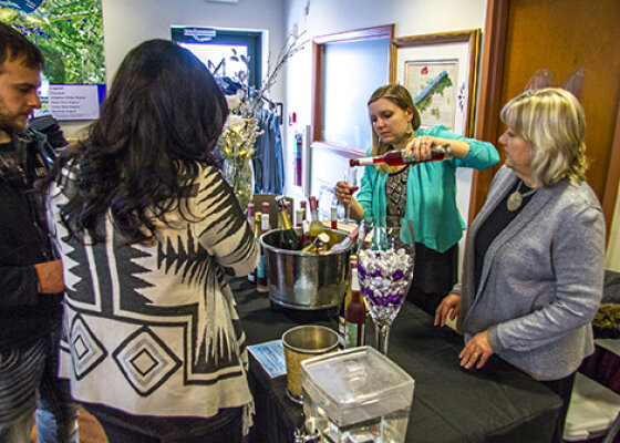 People Enjoying Samples of Wine in Lake Erie Wine Country