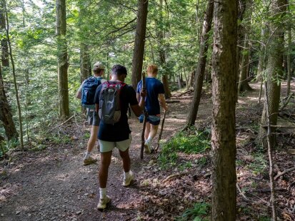 Young men hiking on trail in Chautauqua County New York