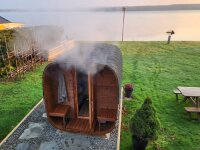 Outdoor Finnish Sauna with steam coming out Lakefront Cottages
