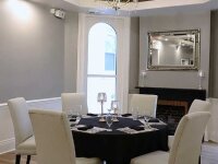 White Inn table next to fireplace