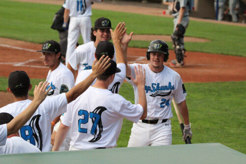 Jamestown Tarp Skunks Players Celebrate
