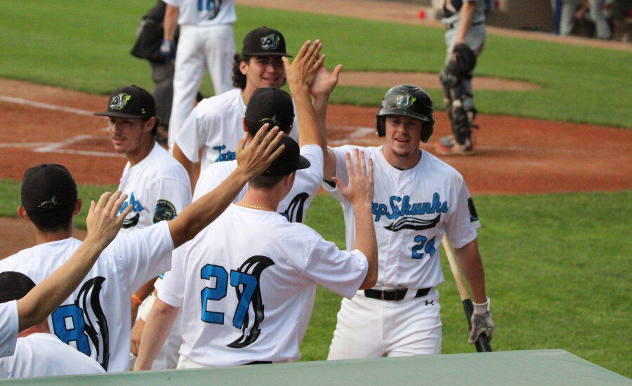 Jamestown Tarp Skunks Players Celebrate