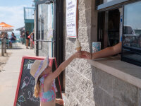 Girl getting ice cream cone web