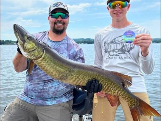Brandon and Gavin Guthrie with their 45-inch musky - Chautauqua Musky Champions
