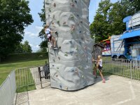 Midway girls on rock wall