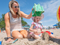 Mom and daughter playing on beach 3 web