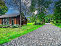 Chautauqua Farmhouse Retreat garage and driveway