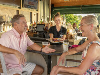 Couple at Carousel Bar at Chautauqua Harbor Hotel