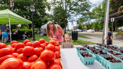 Mom and daughter browsing at Fredonia Farmers Market web